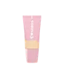 Embalagem com tampa cor-de-rosa claro, com inscrição de nome. Parte superior com tom da base e detalhes brancos na parte inferior, com pequenas estrelas decorativas ao redor. A embalagem tem um design minimalista e delicado.