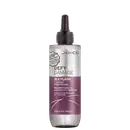 É um produto de tratamento capilar da marca Joico. A embalagem é um frasco que tem um aplicador preto na parte superior. O rótulo na frente é predominantemente branco e roxo. O nome do produto "Defy Damage In a Flash" está escrito em letras grandes;