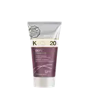 A embalagem é um tubo plástico roxo, branco e prateado com detalhes em dourado. O rótulo frontal apresenta o nome do produto e informações como "para fortalecer e criar ligações".