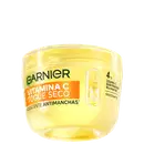 Hidratante Facial Garnier Toque Seco Antimanchas 85g em pote redondo amarelo.