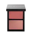 Paleta Océane contendo dois compartimentos de blush em tons de rosa, apresentando uma paleta compacta e elegante de maquiagem.