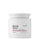 Frasco branco de máscara capilar Blonde Savior da marca Keune, com rótulo preto e cinza, contendo 500 ml do produto. Destaca-se o extrato de pérola como ingrediente.