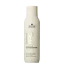 Frasco branco de shampoo Schwarzkopf Professional Blond Me Bond Repair Brightening 300ml, com rótulo preto destacando o nome do produto e sua função de reparar e iluminar os cabelos.