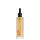 Frasco conta-gotas de Sebastian Professional, com líquido dourado brilhante e rótulo preto com texto em amarelo.