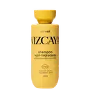 Frasco amarelo de shampoo Vizcaya Nutri-Hidratante, com 250 ml de volume, contendo óleos de argan, macadâmia e mirra, para cabelos ressecados e sem brilho.