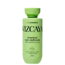 Frasco verde de shampoo Vizcaya Curl Nutrition com rótulo destacando "Nutri-definição" para cabelos cacheados e crespos, contendo óleos de moringa e baobá, além de manteiga de karité.
