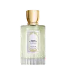 Frasco de Eau de Parfum Encens Flamboyant da Annick Goutal. Embalagem em vidro cilíndrico com líquido verde claro, tampa dourada e rótulo branco com ornamentação dourada. Design elegante e refinado.