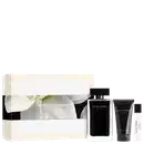 Conjunto Narciso Rodriguez For Her contendo frasco de eau de toilette em vidro preto, tubo de body lotion preto e miniatura de perfume. Embalagem bege com flores brancas.