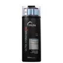 Frasco preto de shampoo da marca Truss, com rótulo em branco e vermelho. O produto é descrito como indicado para cabelos extremamente ressecados e danificados, contendo ativos orgânicos de alta tecnologia.