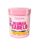 Embalagem rosa de máscara capilar da linha Forever Liss Professional, com rótulo indicando "Desmaia Cabelo" e ingredientes como Keratina Brasileira, D-Pantenol e Colágeno.