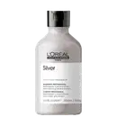 Frasco branco de shampoo profissional da L'Oréal Professionnel, série Expert, com rótulo preto e branco indicando o produto "Silver" com violeta e magnésio.