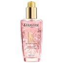 Frasco rosa com tampa dourada contendo o produto "Elixir Ultime L'Huile Rose" da marca Kérastase Paris, um óleo capilar de tratamento.