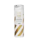 Frasco branco com rótulo dourado da linha Skelt, contendo "Iluminador Corporal Body Glow" com 120ml de volume. Embalagem com design moderno e linhas douradas, indicando um produto de beleza para iluminação e realce da pele.