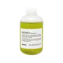 Frasco de shampoo Momo da marca Davines, com 250 ml de capacidade. O produto possui embalagem de plástico transparente com faixa verde e rótulo branco com informações sobre o produto.