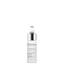 Frasco de vidro branco com conta-gotas da linha Pigmentbio da Bioderma, contendo um concentrado para correção de pigmentação. Rótulo com texto em inglês e francês indicando o nome do produto e sua função de clareamento.