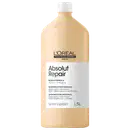 Frasco de item de perfumaria da marca L'Oreal Professionnel, com rótulo branco e amarelo claro. Contém 1,5 litros de "Absolut Repair" - um shampoo profissional para cabelos secos e danificados, com fórmula à base de proteínas e ômega-9.
