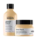 Dois produtos da linha Absolut Repair da L'Oréal Professionnel Paris: um frasco de shampoo de 300 ml e um pote de tratamento condicionador de 250 g, ambos com embalagens pretas e brancas.