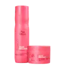 Dois produtos da linha Wella Professionals Color Brilliance, com embalagens em tom de rosa vibrante. Um frasco de shampoo e um pote de máscara, ambos com o nome da linha e o texto "with lime caviar" visível.