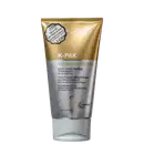 Trata-se de um frasco de tratamento capilar da marca Joico, chamado K-PAK Reconstructor. O produto é apresentado em uma embalagem dourada e prateada, com rótulo destacando suas propriedades de tratamento profundo e penetrante para cabelos danificados.