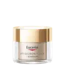 Frasco de creme facial da marca Eucerin, com tampa dourada e rótulo em branco e azul, contendo a inscrição "Hyaluron-Filler + Elasticity".