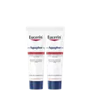 Dois tubos brancos da marca Eucerin contendo pomada reparadora Aquaphor, com rótulos azuis e vermelhos, para cuidados com pele seca e agredida.