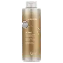 Frasco de condicionador de 1 Litro da marca Joico, da linha K-Pak, com embalagem em tons dourados e brancos. O rótulo destaca o "Selo de Originalidade World Comexx" e a função de reconstrução do produto.
