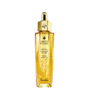 A imagem mostra o frasco do óleo hidratante Abeille Royale da Guerlain. É um frasco de vidro transparente contendo um líquido dourado brilhante, tem um formato cilíndrico alongado com uma tampa dourada na parte superior, com uma abelha estampada.