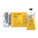 Dois itens da marca Nativa SPA Ameixa Dourada, sendo uma caixa branca com rotulo amarelo e detalhes pretos contendo dois sabonetes em barra de 90g cada e uma bisnaga com degradê de prata e amarelo com tampa preta de gel creme para as mãos.