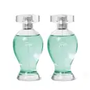 Dois frascos transparentes em formatos curvilíneos com líquidos azuis, pulverizadores prateados e tampas transparentes contendo desodorante colônia Boticollection Free.