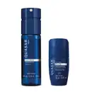 Dois produtos de beleza da marca Quasar: um desodorante em spray corporal azul de 100 ml e um desodorante roll-on antitranspirante azul de 55 ml, ambos com embalagens de design moderno e minimalista.