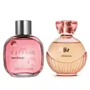 Imagem de dois itens de perfumaria feminina O Boticário, sendo um vidro transparente com líquido rosa e tampa prateada da marca Celebre Sua Força e um vidro arredondado transparente com líquido rosa e borrifador dourado da marca Liz.