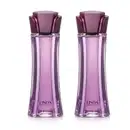 Imagem de dois frascos de desodorante colônia Linda Irresistível, em embalagem de vidro roxa com tampa alguns tons mais escuro em formato de flor e rótulo em letras pretas. Cada recipiente traz 100ml da fragrância.