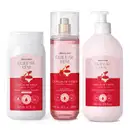 Imagem do Combo Cuide-se Bem Cereja De Fases que traz um sabonete líquido, uma loção corporal de 400ml e um body splash. As embalagens são delicadas, em vários tons de rosa e têm uma linda cereja ilustrando o rótulo.