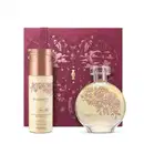 Caixa de presente de cor vinho com um grande coração contendo ilustrações em relevo de temática celestial. Ao lado, um frasco de Floratta Gold em embalagem de frasco de vidro rosa claro e flores em alto relevo e frasco de body spray rosa com tampa rosé.
