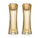 Imagem de dois frascos de desodorante colônia Linda, em embalagem de vidro transparente com líquido bege e tampa em formato de flor na cor dourada. O rótulo traz o nome da marca em letras pretas. Transmite beleza e elegância.