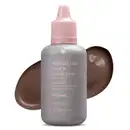 Frasco branco com fundo escuro e letras bege contendo 24g de base líquida e corretivo Reboco HD na cor 80 da marca Intense. Atrás da embalagem, uma pequena porção do produto, na cor marrom escura, mostrando a real tonalidade do produto.