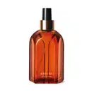 Vidro laranja de tampa spray preta com detalhe e letras douradas contendo 250ml de aromatizador de ambientes Casa 214 Vanilla Sublime.