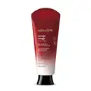 Bisnaga com degradê de vermelho escuro e branco, letras douradas e brancas com tampa preta contendo 180ml de loção aveludada corporal Nativa SPA Cereja Rouge.