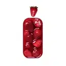 Um gif simulando o frasco do produto sendo coberto por chocolates e morangos, formando uma barra doce.