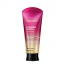Bisnaga de creme corporal perfumado da marca Nativa SPA Orquídea Lumière, com cores em degradê de rosa e dourado, com tampa preta e informações sobre o produto escritas em branco no rótulo.
