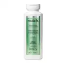 Frasco branco com rótulo verde metalizado e letras pretas e brancas contendo 300ml de shampoo da marca Match Oleosidade Controlada.