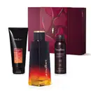 Kit de produtos da marca Malbec X, incluindo frasco de desodorante colônia preto e dourado, bisnaga de gel de banho preta com rótulo vermelho, embalagem preta com letras douradas de antitranspirante aerossol jato seco e caixa vinho com detalhe dourado.