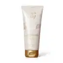 Frasco branco e com tampa e letras douradas contendo 200ml de  loção hidratante desodorante corporal da marca L'eau de Lily.