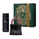 Imagem do Kit Presente Natal Her Code Touch com um vidro preto em formato de cadeado de desodorante colônia, um frasco preto de óleo de massagem corporal e uma caixa verde presenteável com estampa natalina.