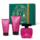 Imagem do Kit Presente Natal Coffee Woman Seduction com um frasco rosa e tampa preta de desodorante colônia, duas bisnagas pinks com tampa preta de sabonete líquido e loção hidratante corpora e uma caixa verde presenteável com ilustração natalina