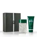 Caixa preta com padrão ondulado, frasco de vidro transparente com tampa verde e bisnaga verde com rótulo Arbo, contendo item de perfumaria e produto para cabelo e corpo.
