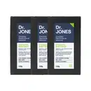 A imagem mostra três sabonetes corporais Dr. Jones. Os sabonetes são pretos, são feitos de carvão ativado e possuem uma embalagem azul e verde de 120g.