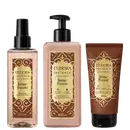 Três produtos Eudora Instance Âmbar Precioso: Body Splash 200ml com spray, Creme Hidratante Desodorante Corporal 400ml com bomba, e Creme Desodorante 150ml em tubo. Embalagens marrom e bege com detalhes dourados ornamentais.