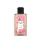 A imagem mostra o Sabonete Líquido Eudora Instance Frutas Vermelhas. Frasco transparente de 75ml com líquido rosa claro. Rótulo rosa com ilustrações de frutas vermelhas estilizadas e detalhes em branco. Tampa preta na parte superior.
