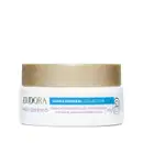 Embalagem tipo pote do Creme hidratante facial fortalecedor da linha Hidra Mineral da Eudora. Embalagem branca com tampa de rosquear dourada na parte superior, rótulo em tons de verde, vermelho e dourado no fundo branco.